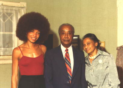 [Photo of Angela
Davis with Jim Grant's parents]